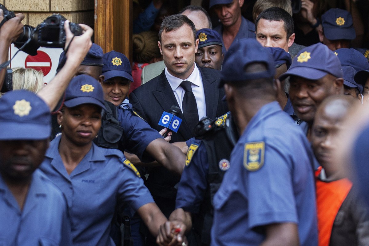 South African Paralympian athlete Oscar Pistorius leaves the High Court after the verdict in his murder trial where he was found guilty of culpable homicide in Pretoria, South Africa on Sept. 12, 2014.Image from here.